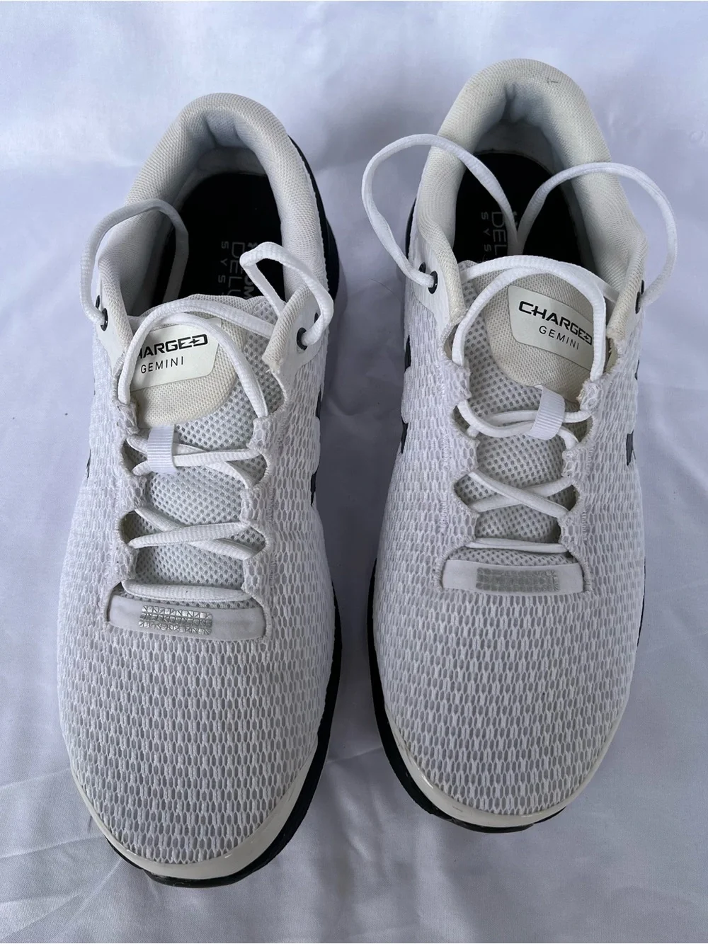 Under Armour (UA Charged Gemini) Mens White and Black Athletic Sneakers